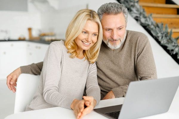 couple looking at a laptop